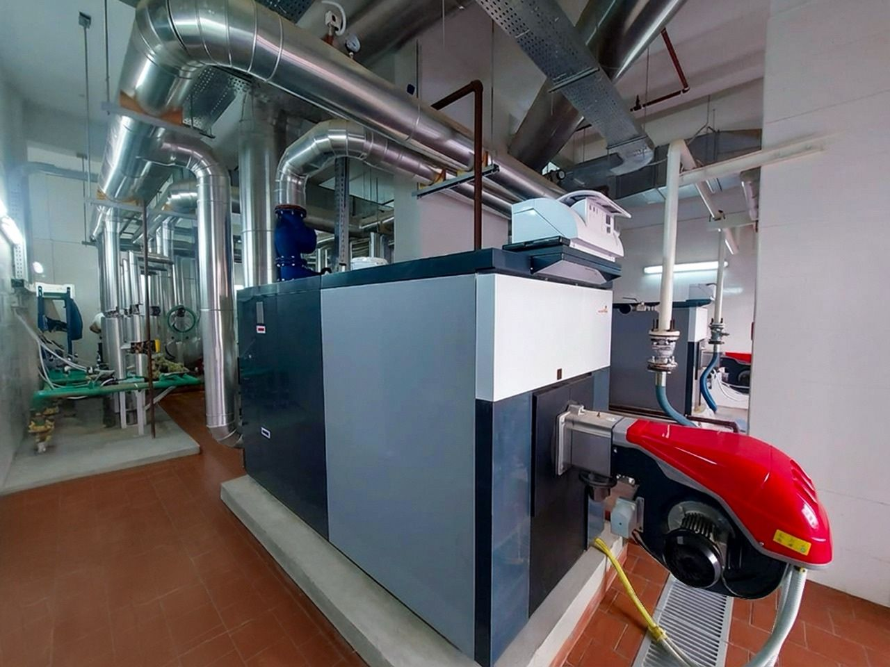 Turnkey design, supply, and installation of hot water boiler rooms